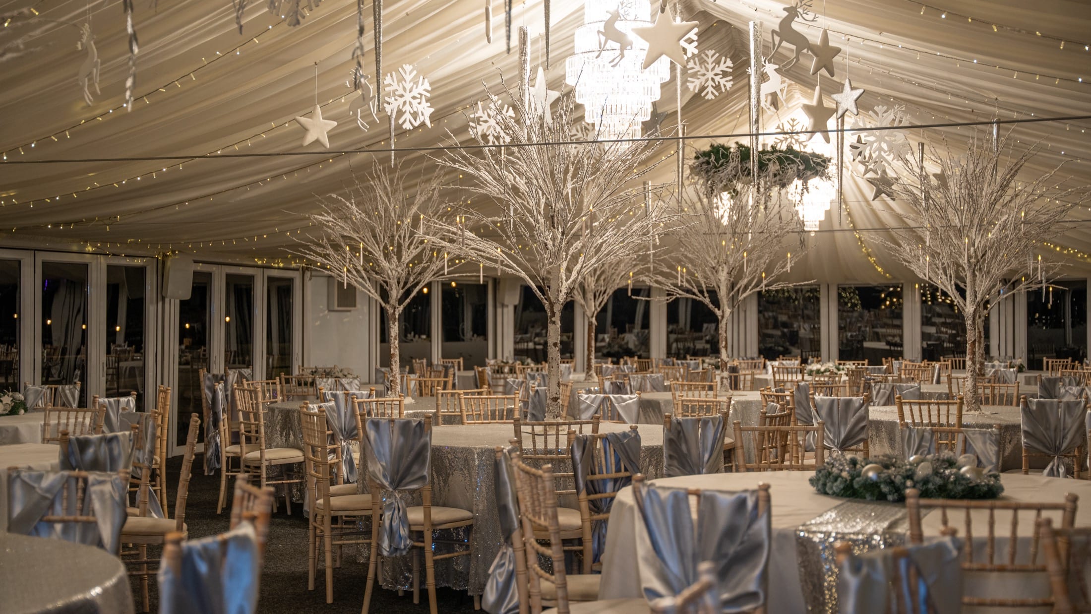The Arboretum decorated for Christmas with snowflakes, white trees and thousands of fairy lights