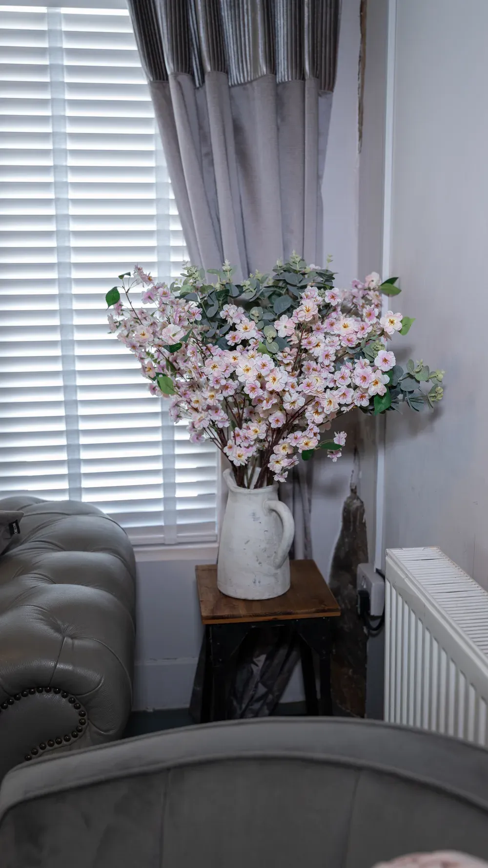 Fresh flowers by the window in The Blossom suite