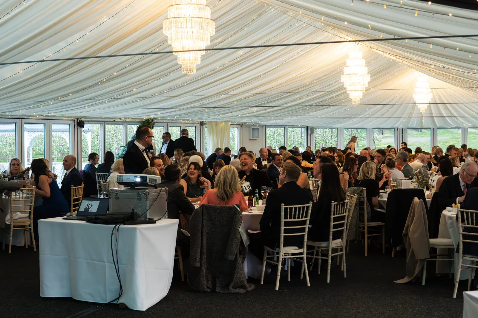 A black-tie corporate dinner in the pavilion at The BarnYard