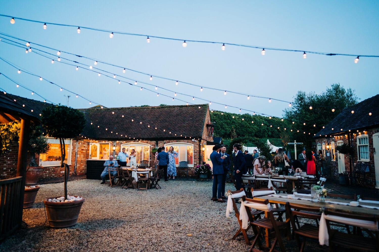 The courtyard outside the Apple Barn lit up for a party