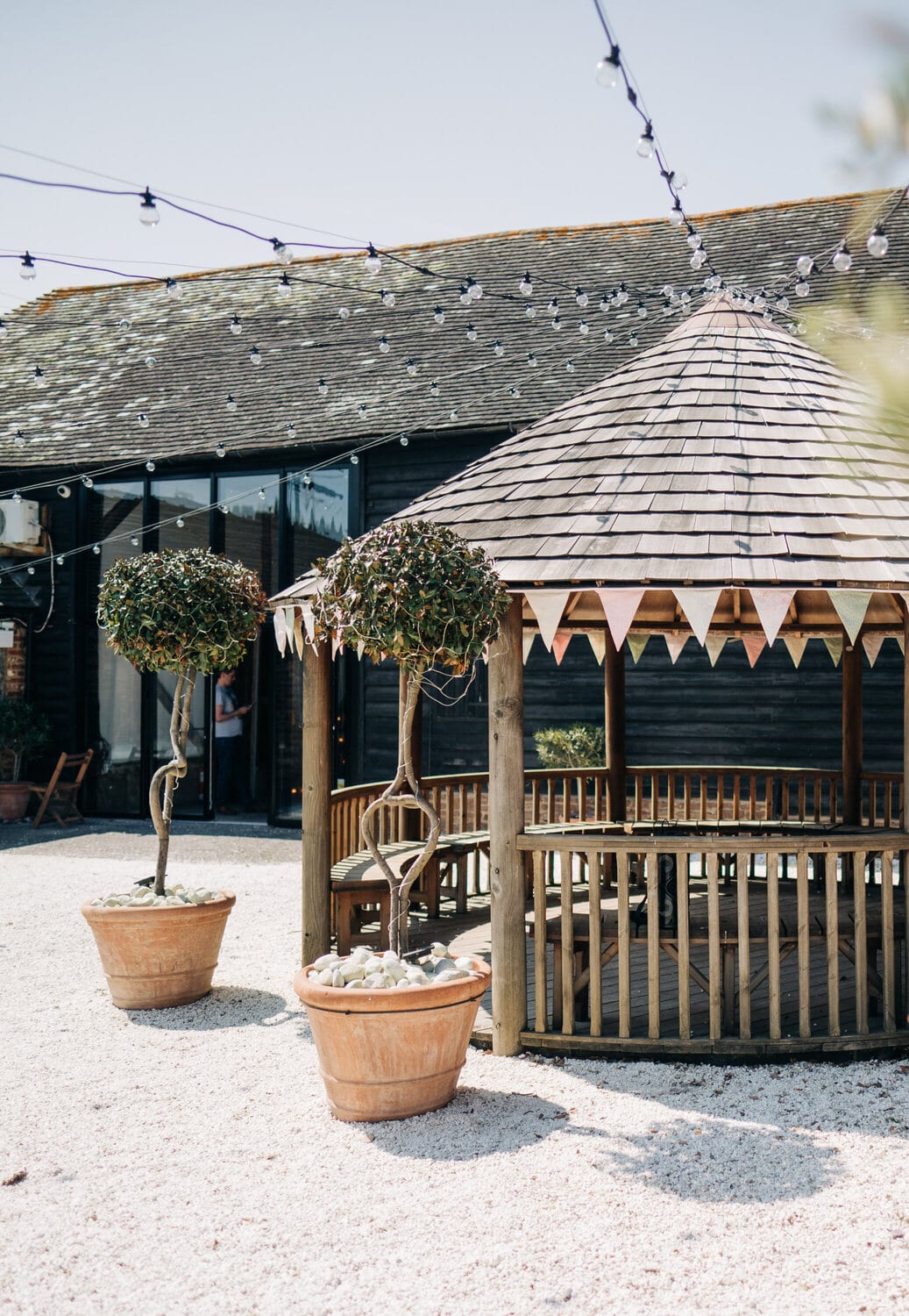 The courtyard gazebo lit for an evening party