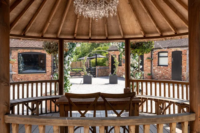 Inside the Courtyard gazebo, looking out to the barns