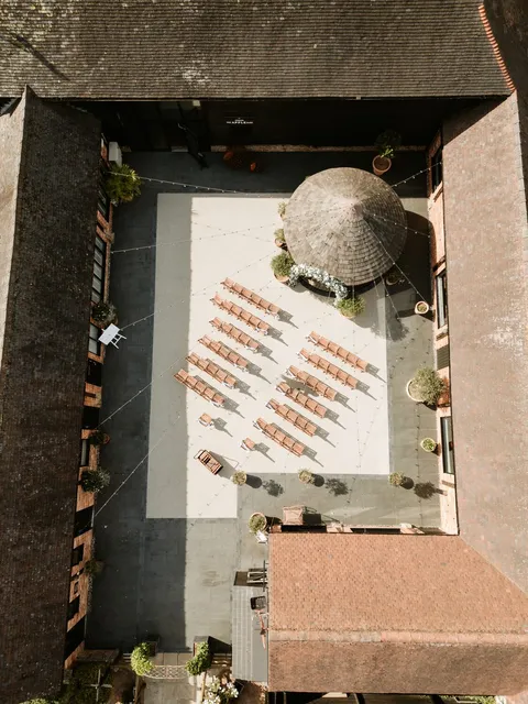 An aerial view of the Courtyard set with chairs outside the Apple Barn
