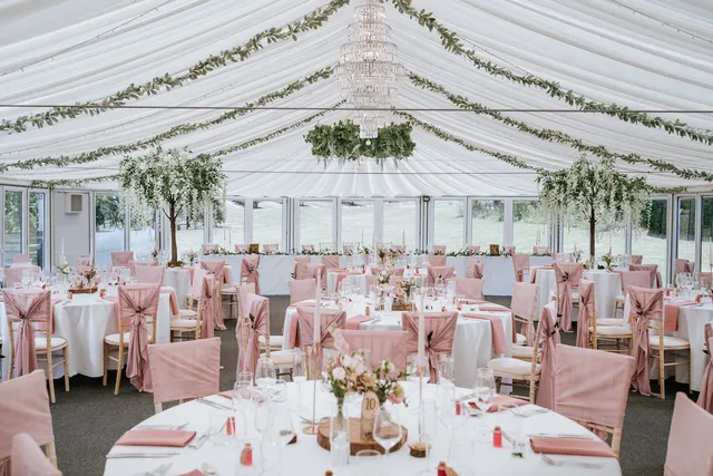 The Arboretum set with blush linen and foliage garlands