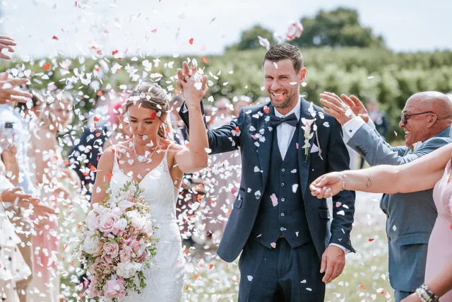 A couple showered in confetti