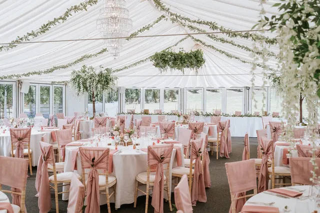 Round tables under the Arboretum chandeliers
