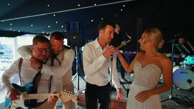 A singer performing with the bride