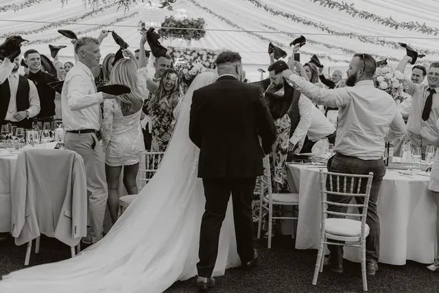 Guests on their feet around the top table