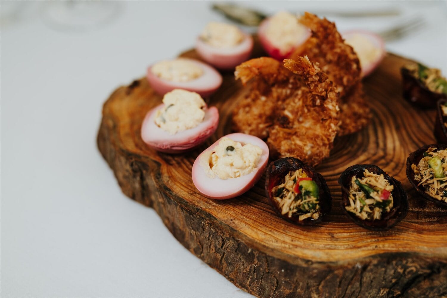 Canapés on a rustic wooden board