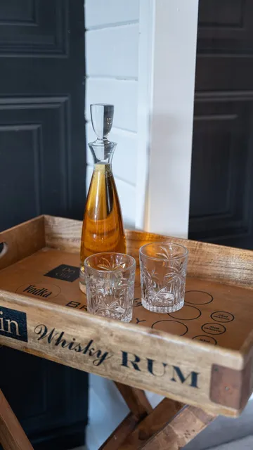 Cut glass tumblers on a whisky tray in The Hyde Out