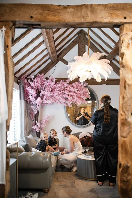 Hair and makeup under the blossom tree in the bridal suite