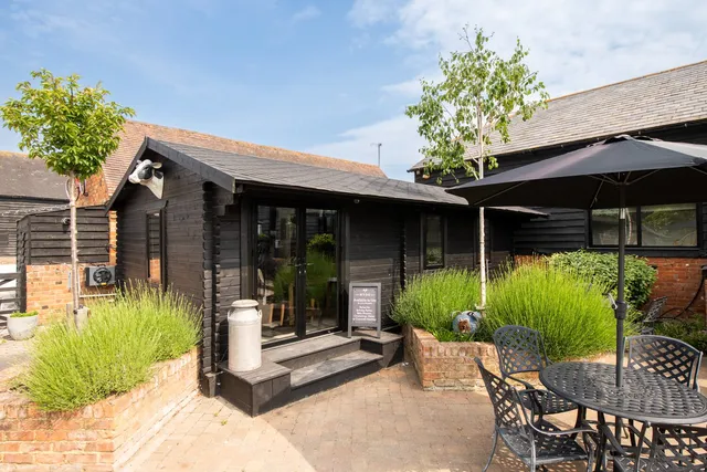 The Hyde Out from the courtyard, lavender at the door