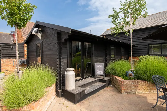 The dressing suites in their black weatherboard building