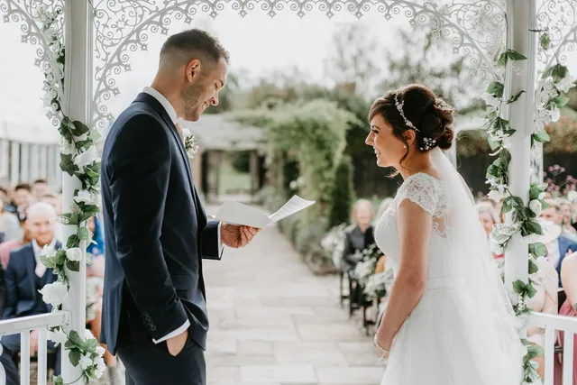 A bride listening during the ceremony
