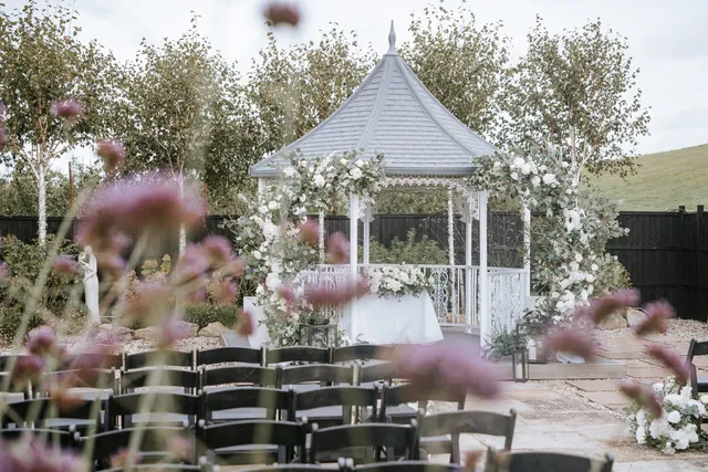 The gazebo set for a ceremony among the lavender
