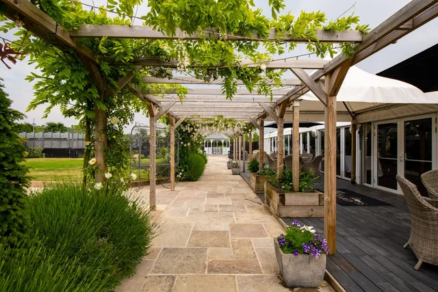 The wisteria pergola walk in summer