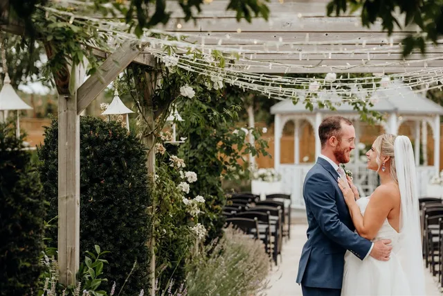 A couple laughing during their ceremony