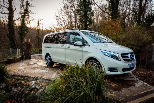 A white Mercedes V-Class people carrier