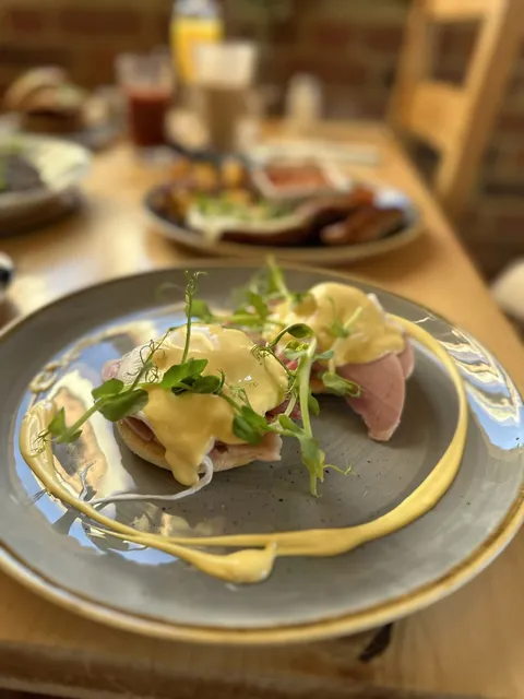 Eggs Benedict with hollandaise and cress