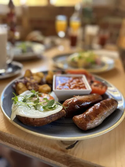 A full English breakfast with beans and sausages