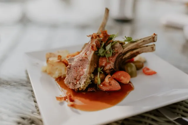 A rack of lamb with roasted vegetables