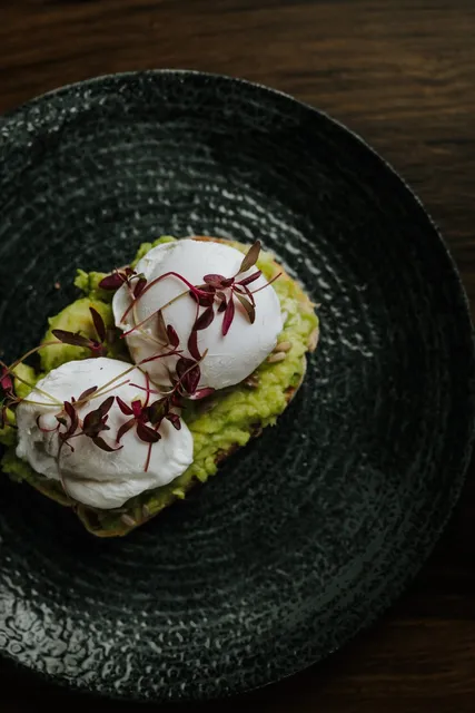 Poached eggs on smashed avocado