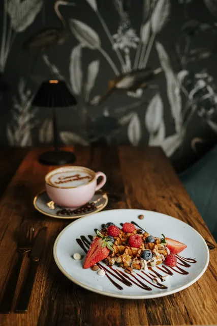 Coffee and waffles on a wooden table