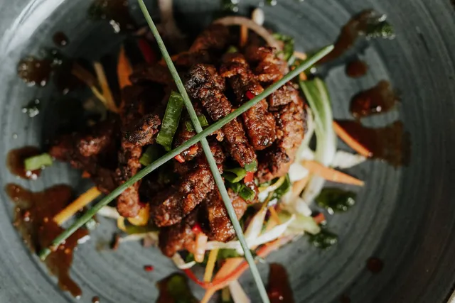 Spiced skewers on a bed of salad