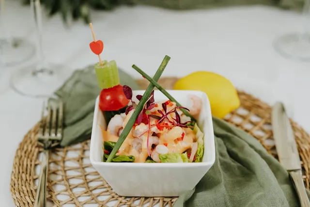 A prawn cocktail with a heart skewer