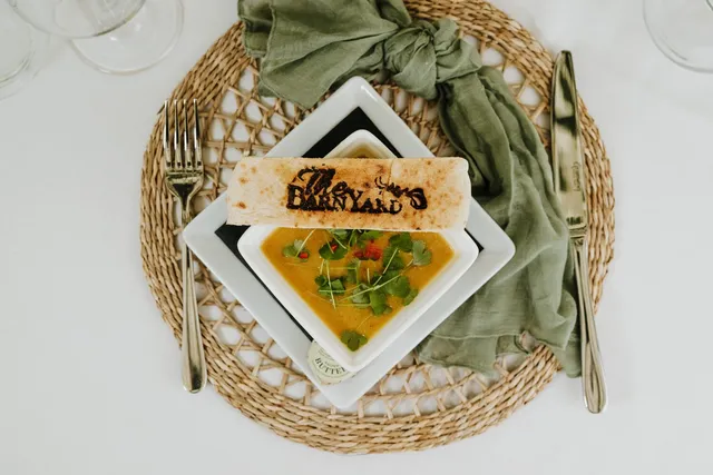 Soup served with a branded BarnYard flatbread
