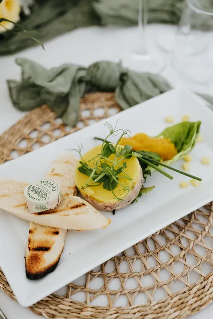 A pate and flatbread starter on a woven mat