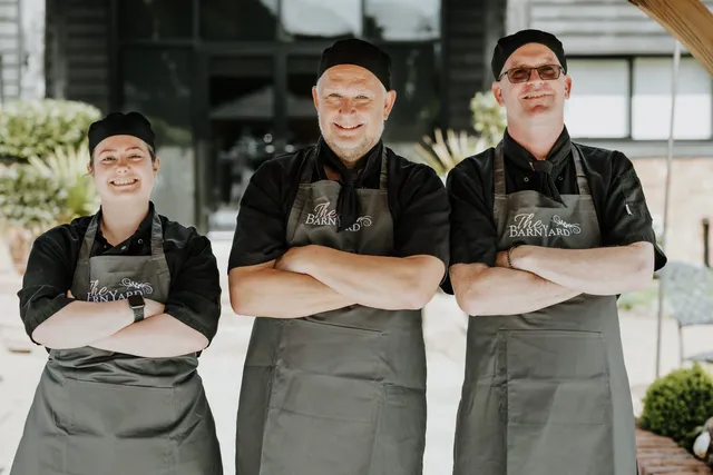 The kitchen brigade outside the barn