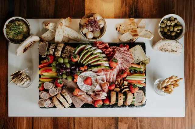 A grazing board of meats, cheeses and fruit