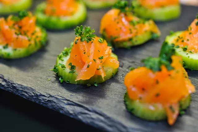 Smoked salmon canapes on cucumber rounds