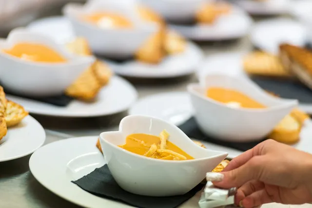 Small bowls of soup ready for service