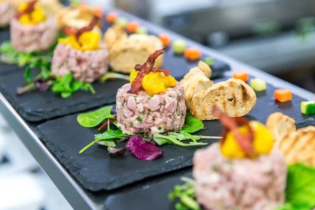 A steak tartare starter on slate