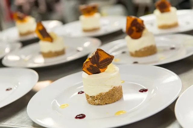A cheesecake finished with a shard of honeycomb