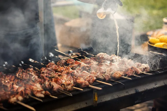Skewers cooking over the barbecue