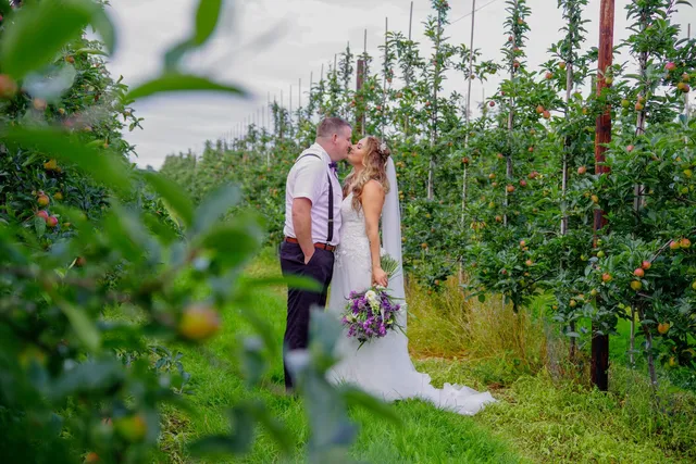 A couple among the fruit trees