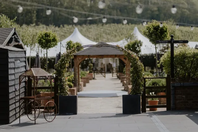 The floral arch and pergola set for a ceremony