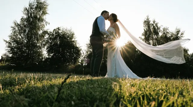 A couple kissing in the last of the light
