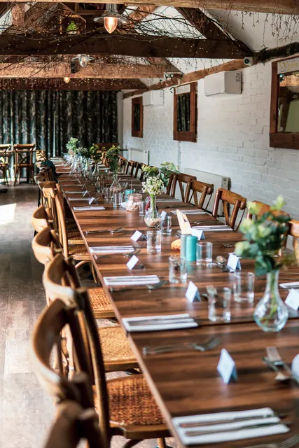 A long table laid for a party at The Roost