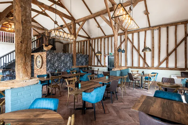 The Rooster's dining room beneath the oak trusses