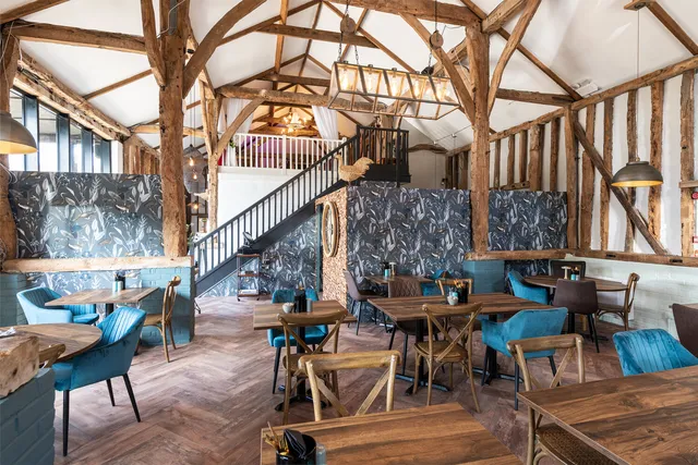 The Rooster's dining room and the staircase up to the Mezzanine