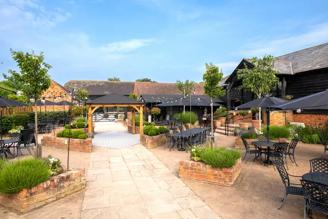 The Courtyard with the barns and outdoor seating