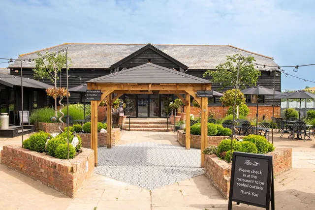 The Courtyard and barns on a summer day