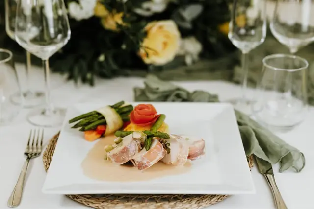 A plated fish course at The BarnYard