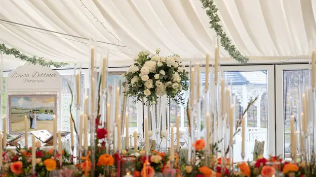 Tables laid in the pavilion for the wedding breakfast