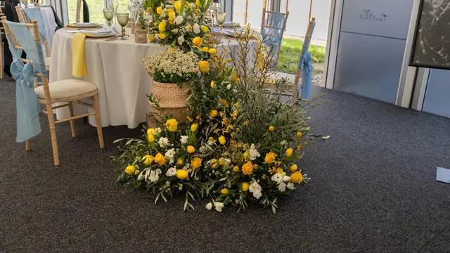 A greenery centrepiece on a wedding table