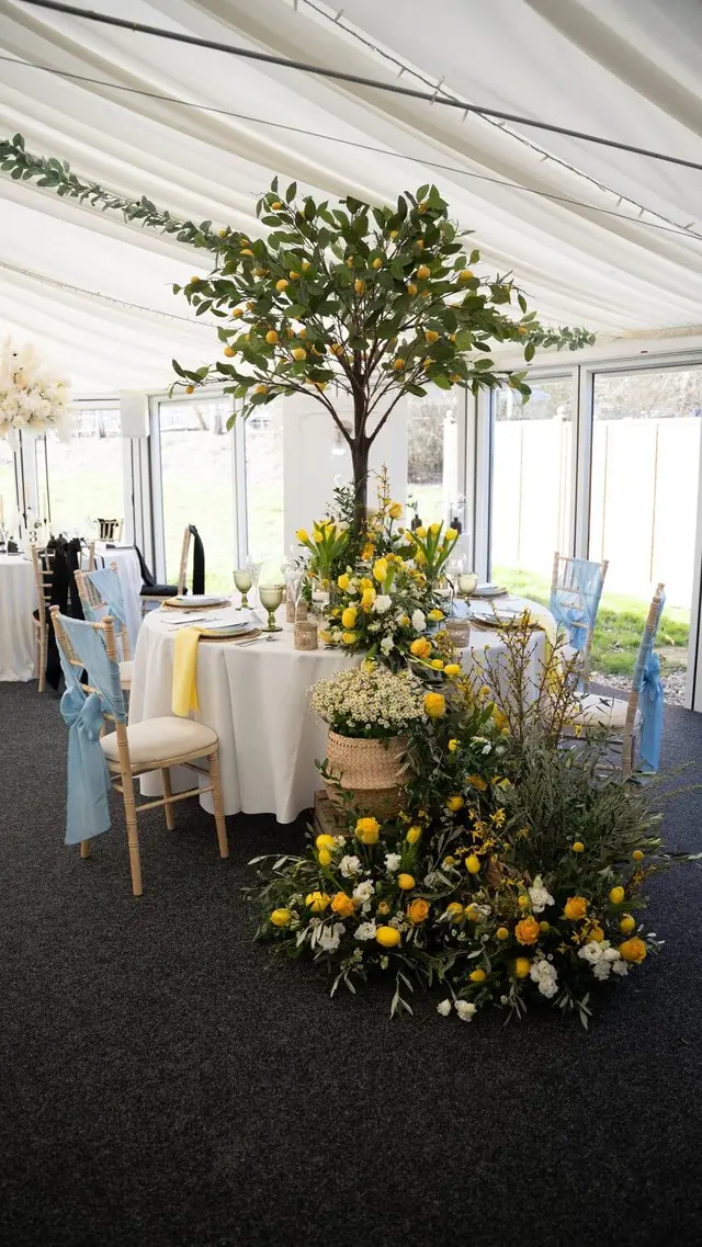 Tables dressed for a wedding breakfast in the pavilion